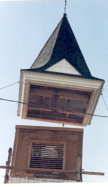 putting the steeple on the church